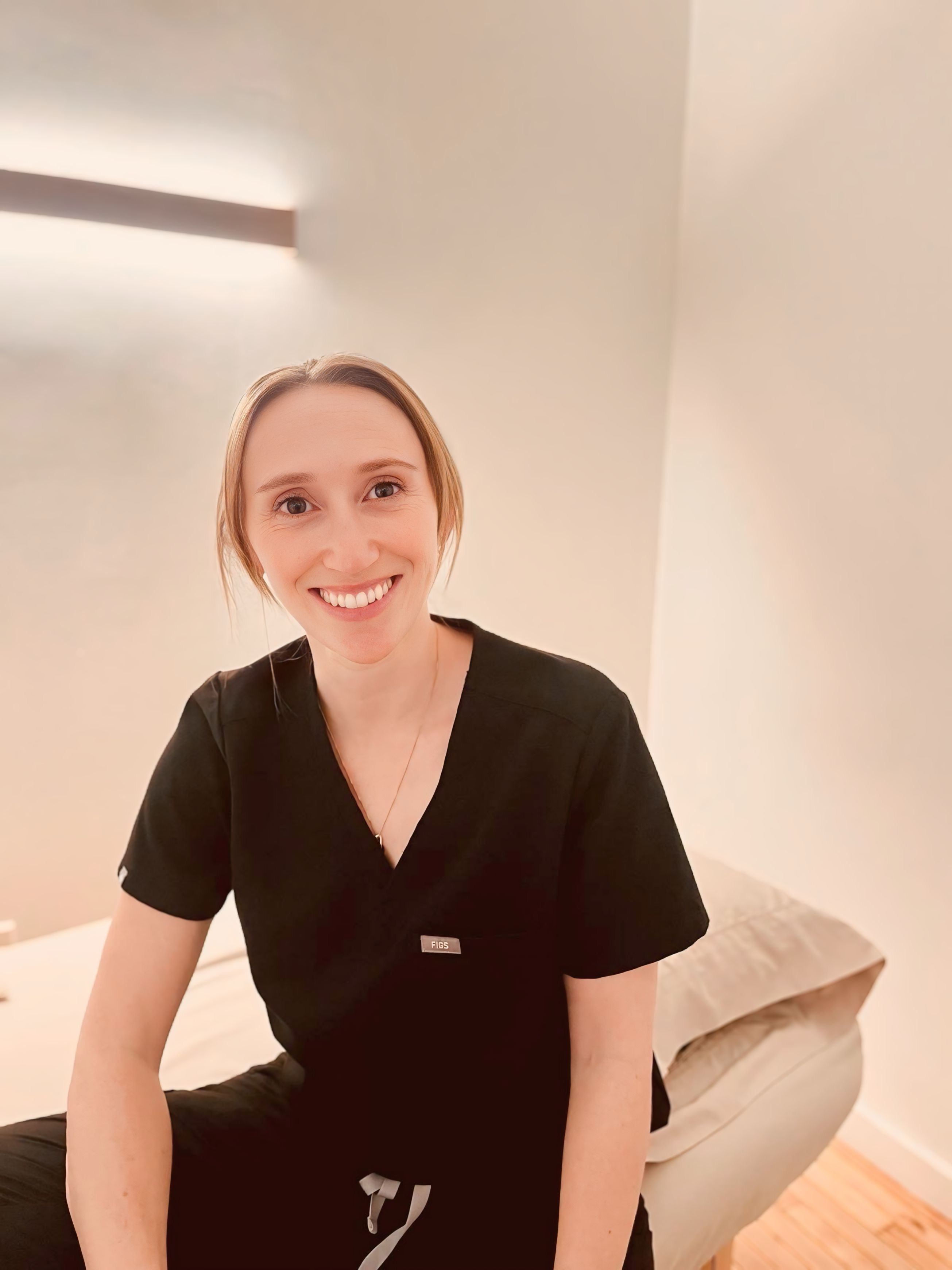 Zara in her acupuncture clinic